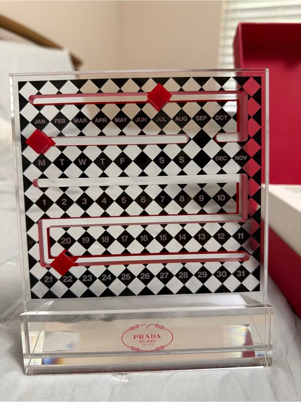 Prada Black & White Acrylic Perpetual Calendar with Red Markers